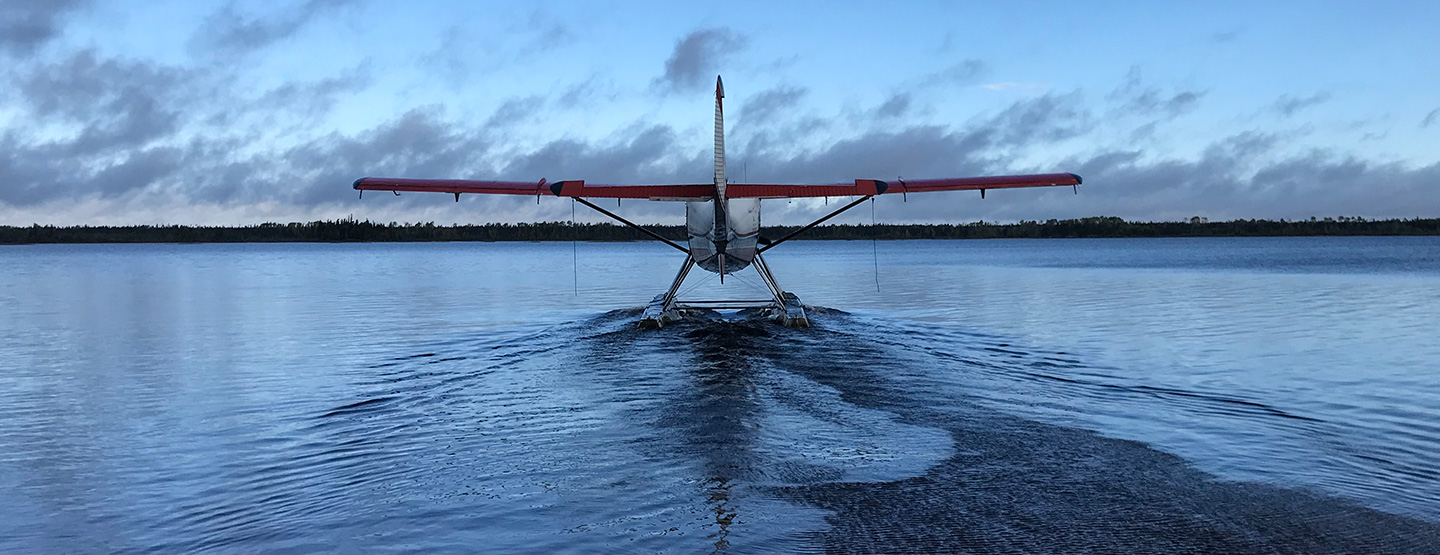 Panoramic shot of a plane ready to take off from the lake
