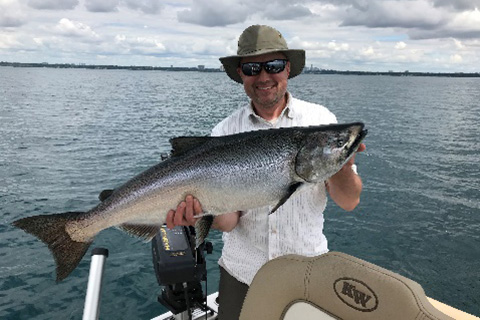 Ralph Papiest holding his trophy fish catch - Port Credit, Lake Ontario