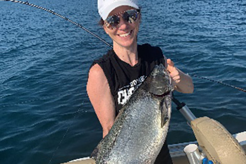 Fiona Cuddy holding her trophy fish catch - Port Credit, Lake Ontario